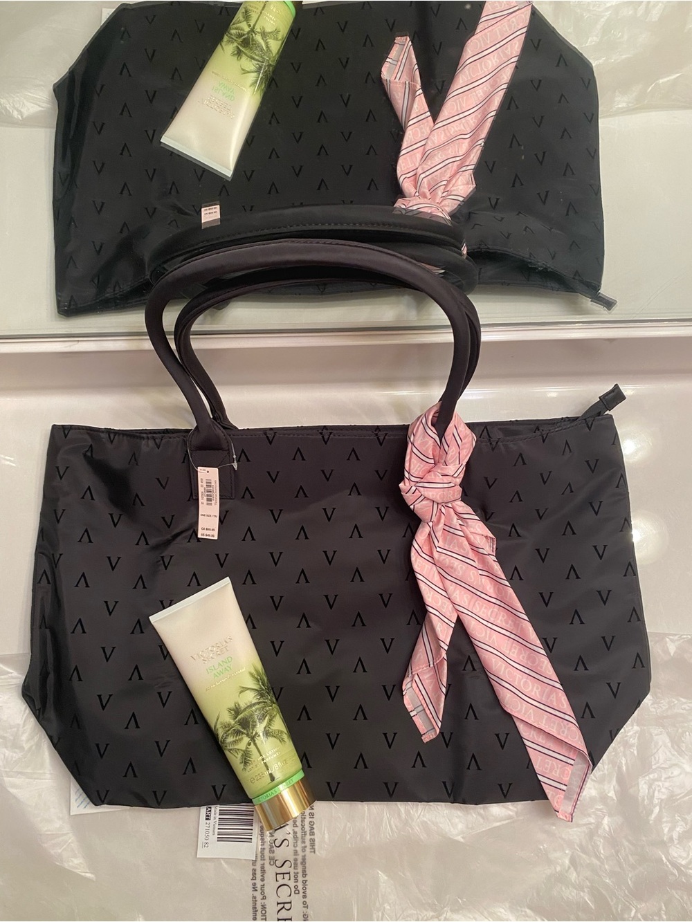 Victoria’s Secret Black Tote Bag with Pink Scarf Accent and lotion